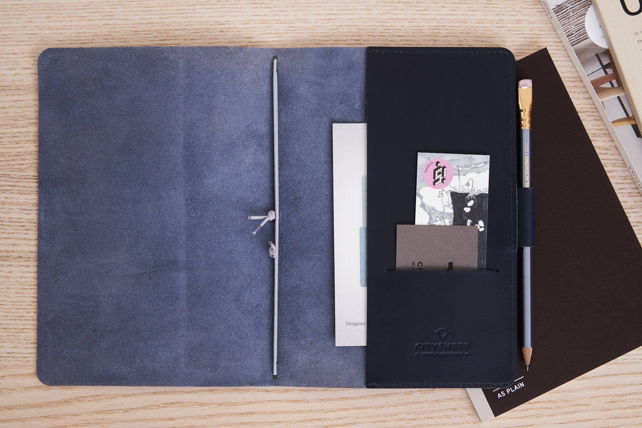A5 travelers notebook cover with pocket and loop for a pencil. Crafted from premium Vegetale tanned leather.