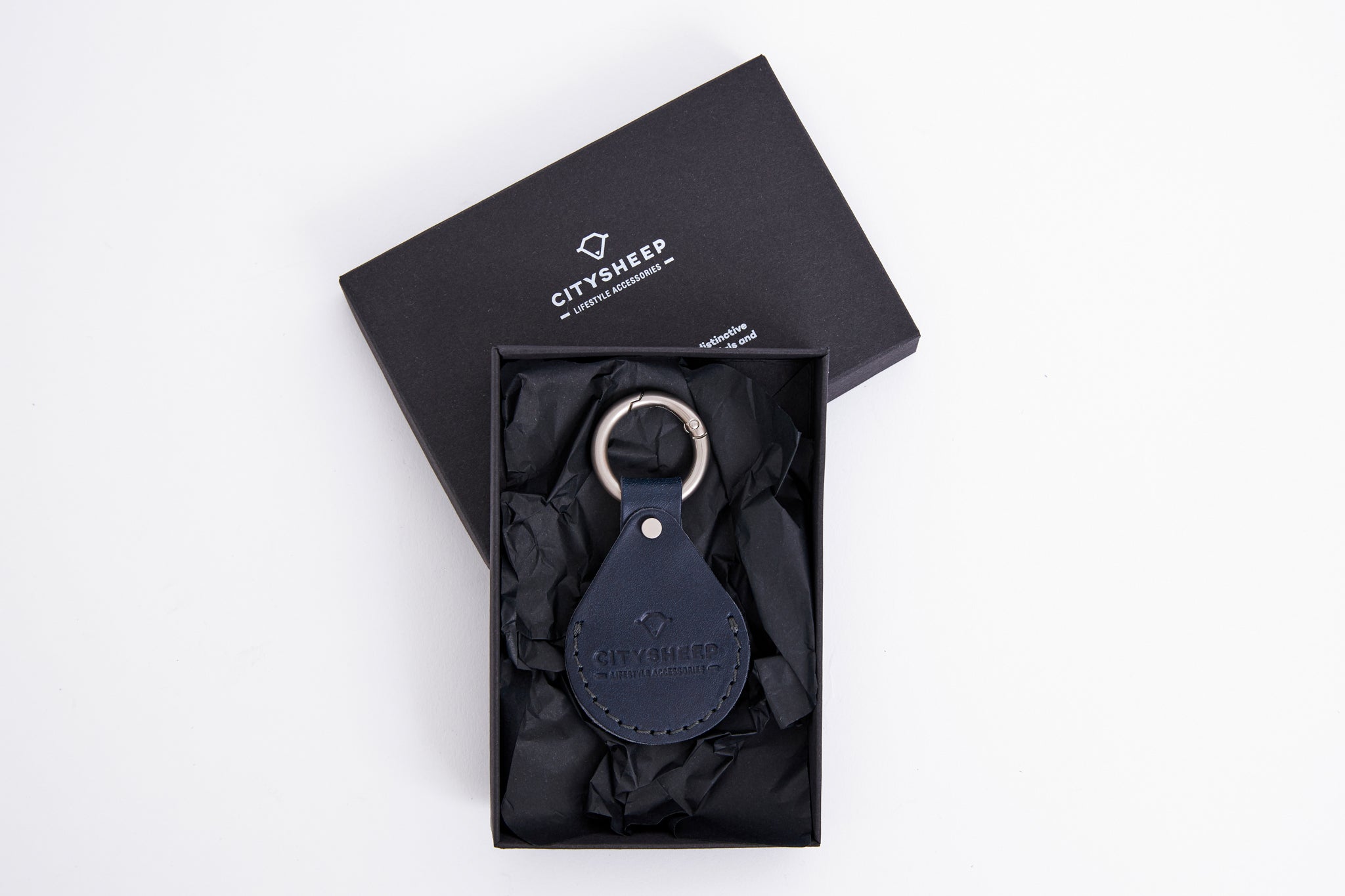 navy blue leather AirTag holder keychain