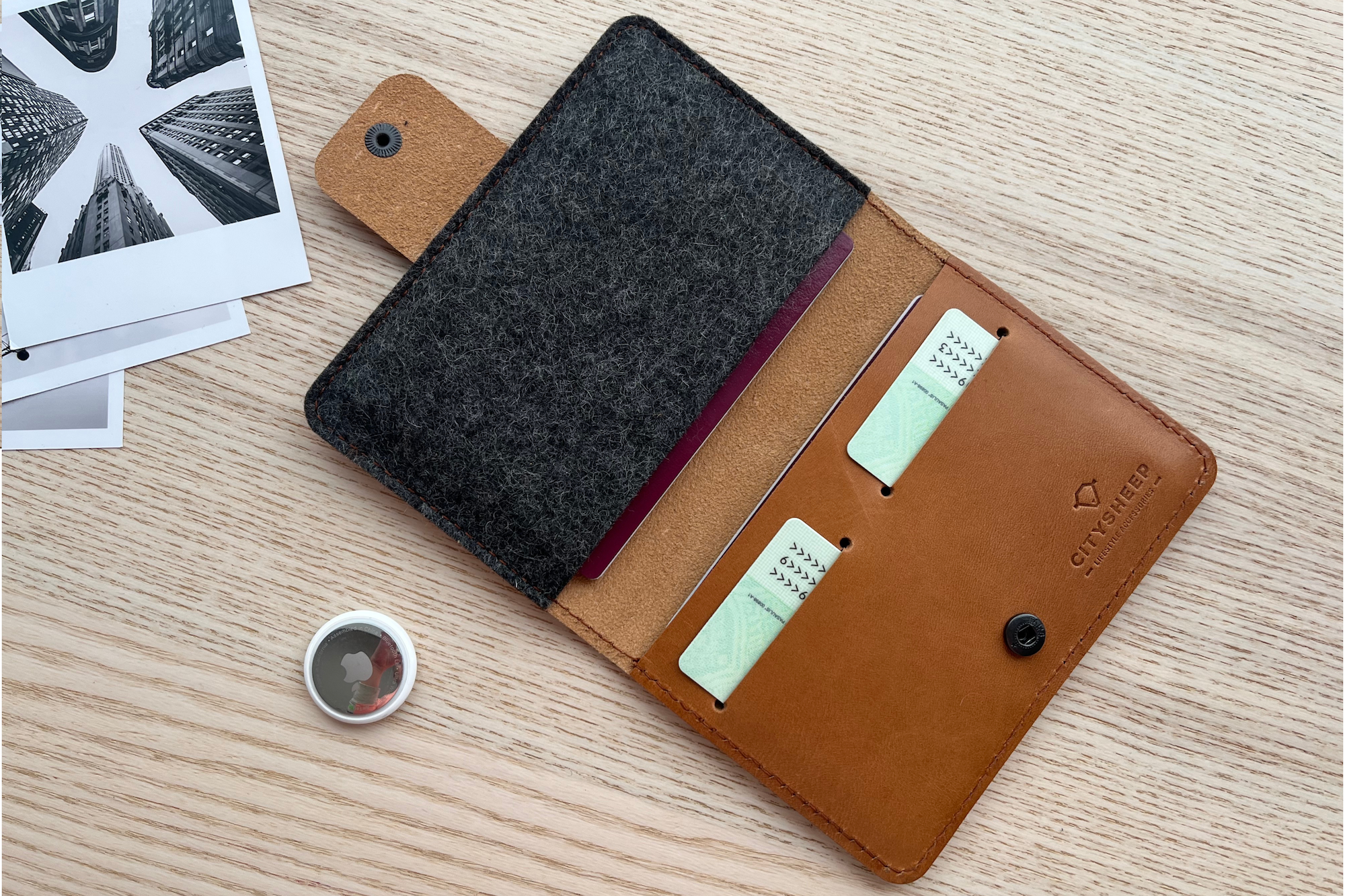leather passport holder with AirTag slot in TAN leather fits up to 4 passports and ID or credit cards.