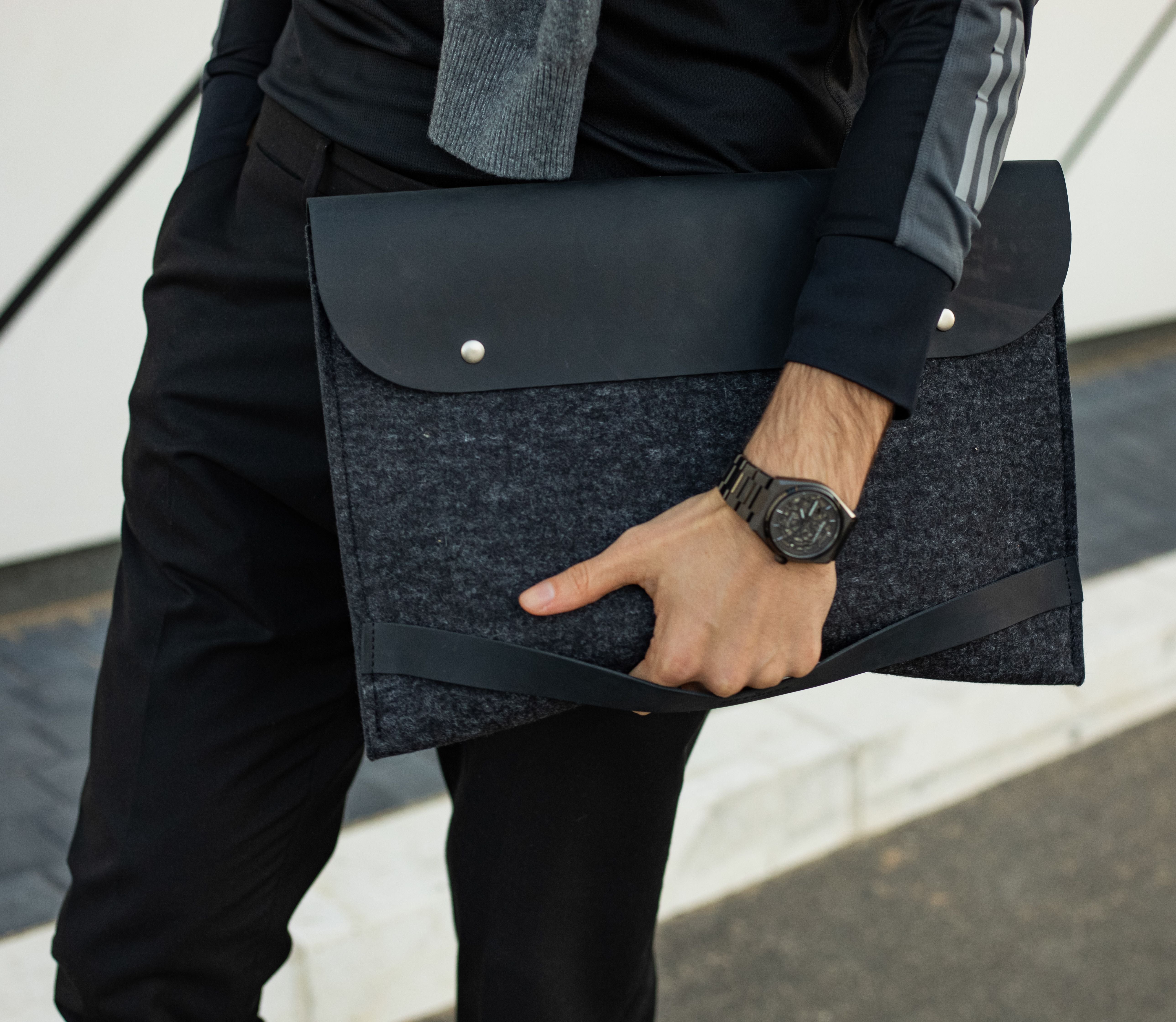 Luxury iPad leather case made from black full grain leather and anthracite wool felt.