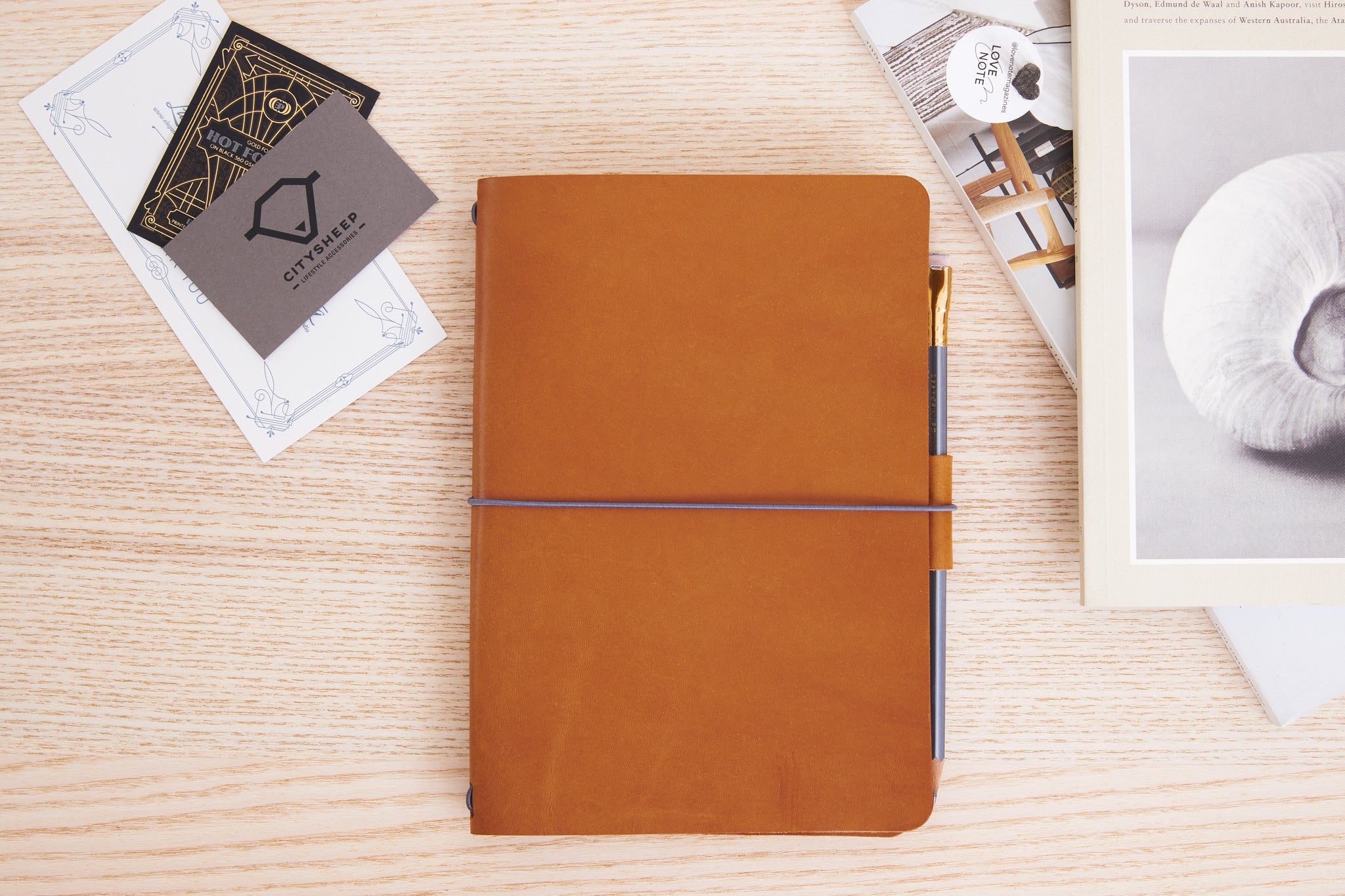 Leather Travelers Journal made from Italian Vegetable tanned leather with pockets.