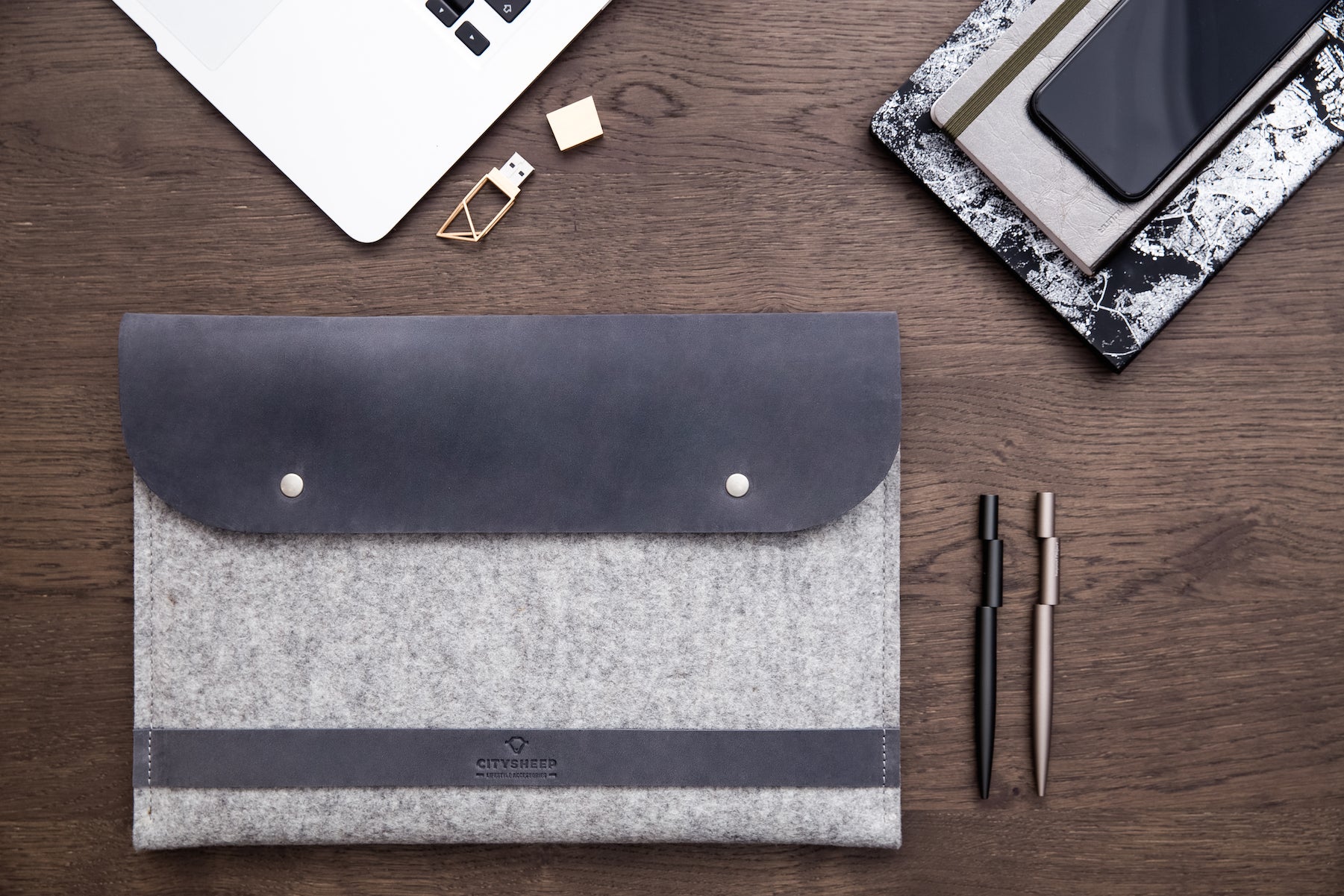 Leather iPad Air/ Pro case with closure crafted from full grain leather and grey wool felt