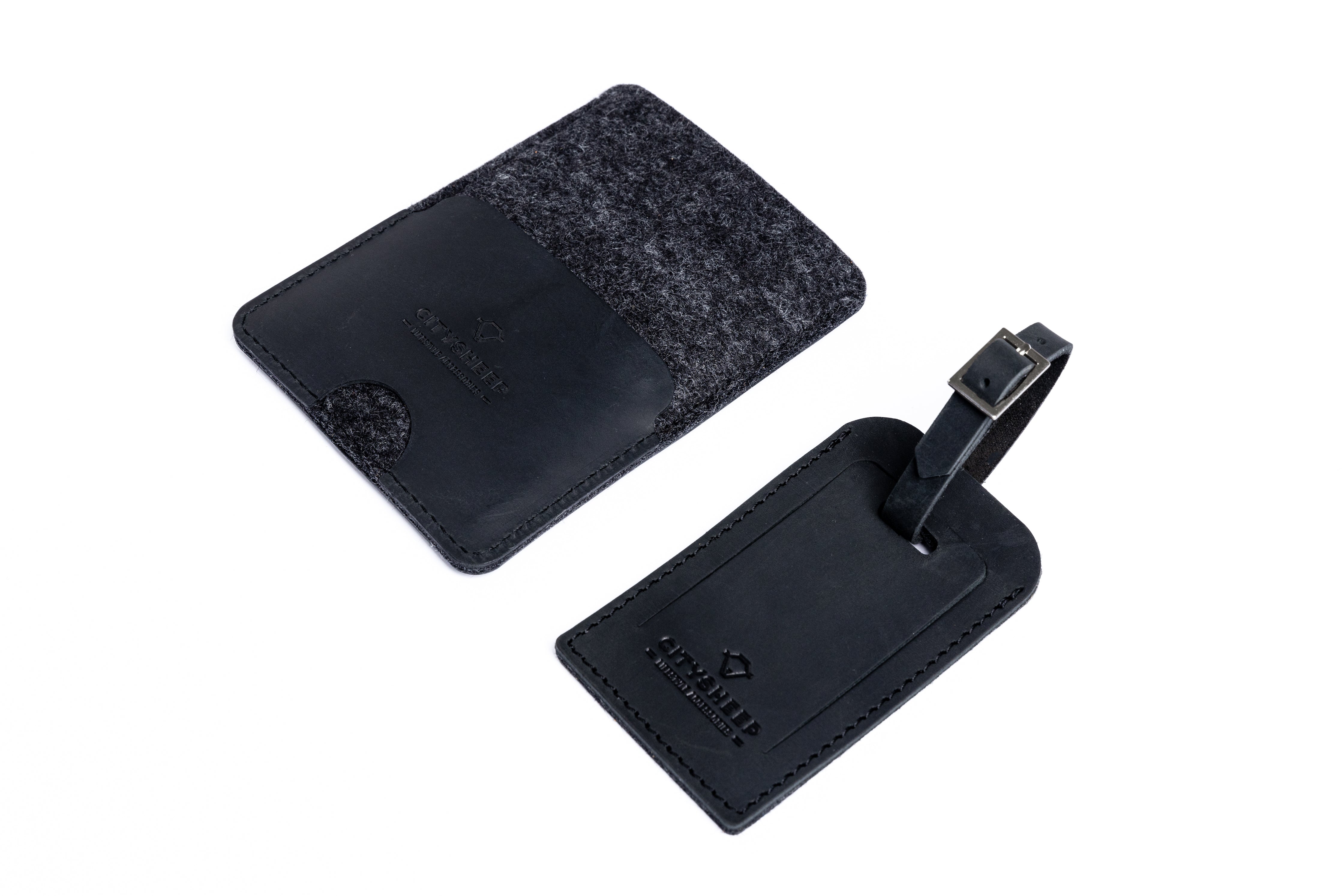 Black leather passport holder with slot for ID or credit card and leather luggage tag