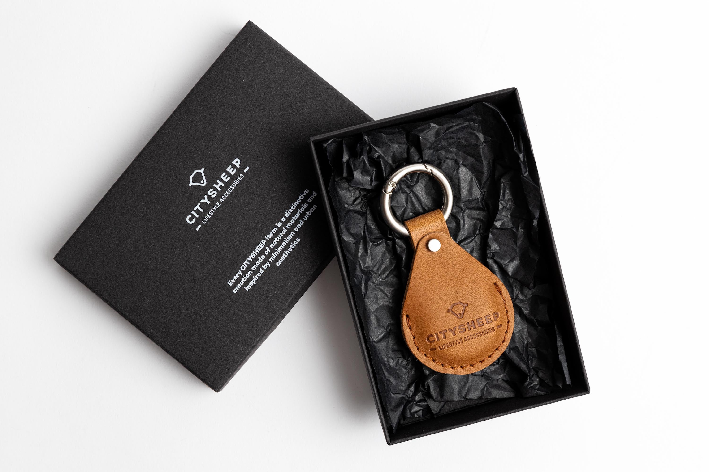 Vegetable tanned leather AirTag holder for Apple tracker n light brown color