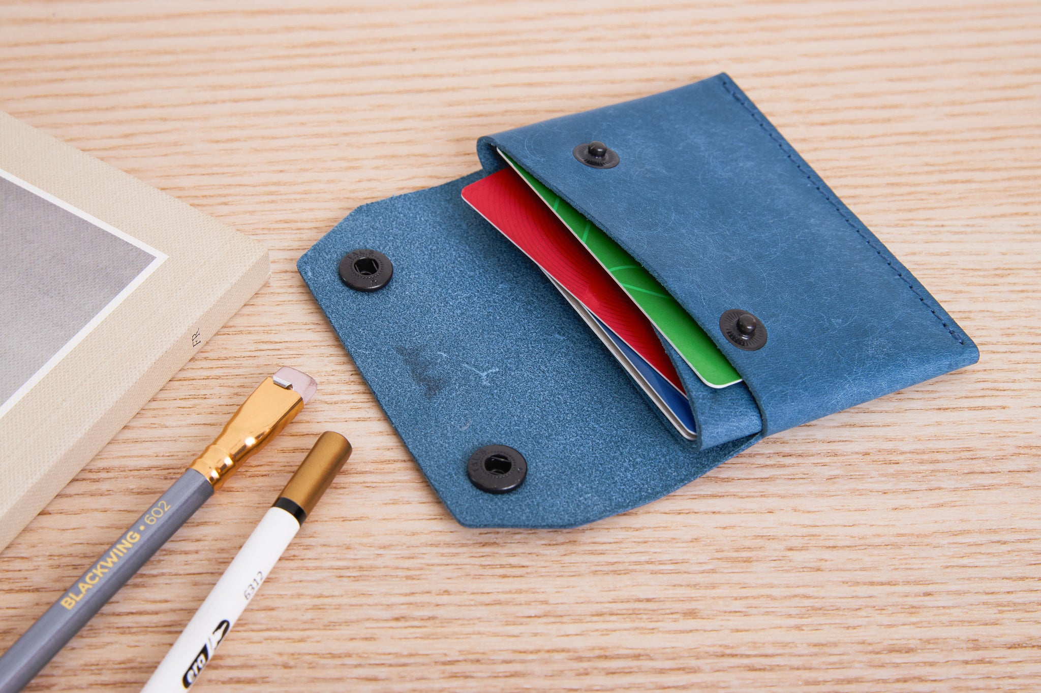 Leather wallet with AirTag slot for cards and cash blue leather