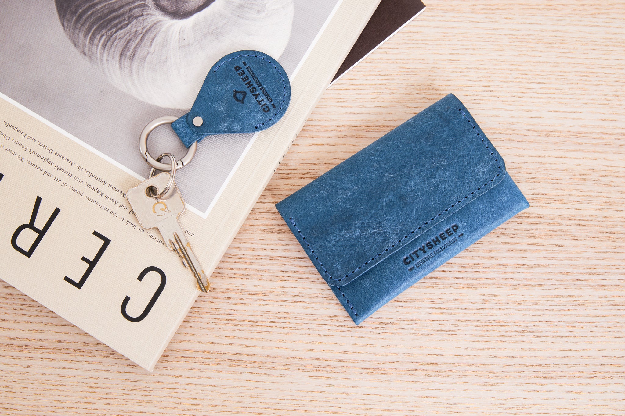 AirTag keychain for her or him, blue color.