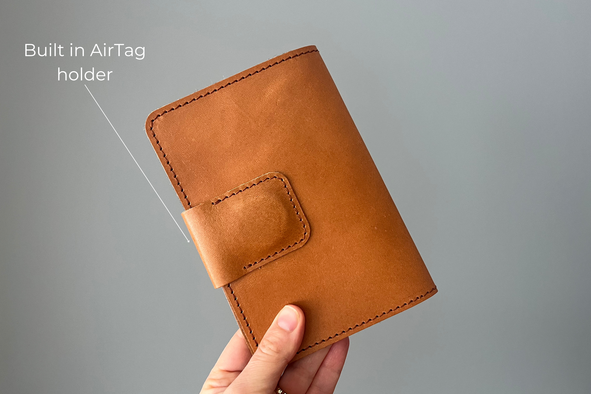Full grain leather passport holder with AirTag slot. Fits 1/ 2/ 3/ 4 passports and cards.