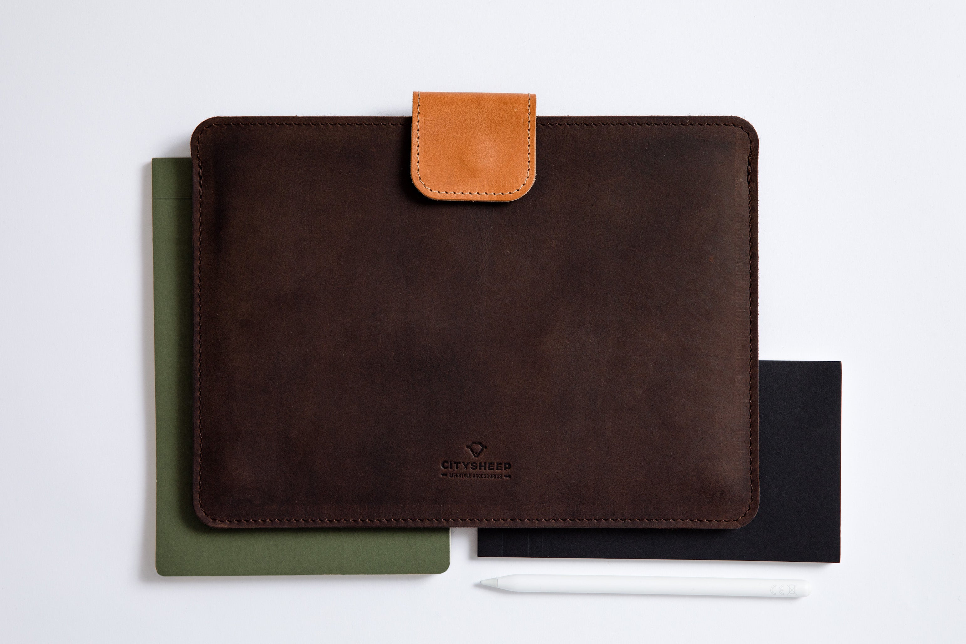 iPad leather sleeve dark brown color, made from distressed crazy horse leather. Slim fit design.